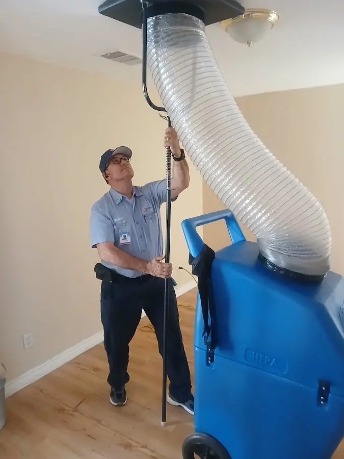 HVAC Installation technician using HEPA equipment in Halfway